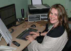 Marie Crawley at her desk